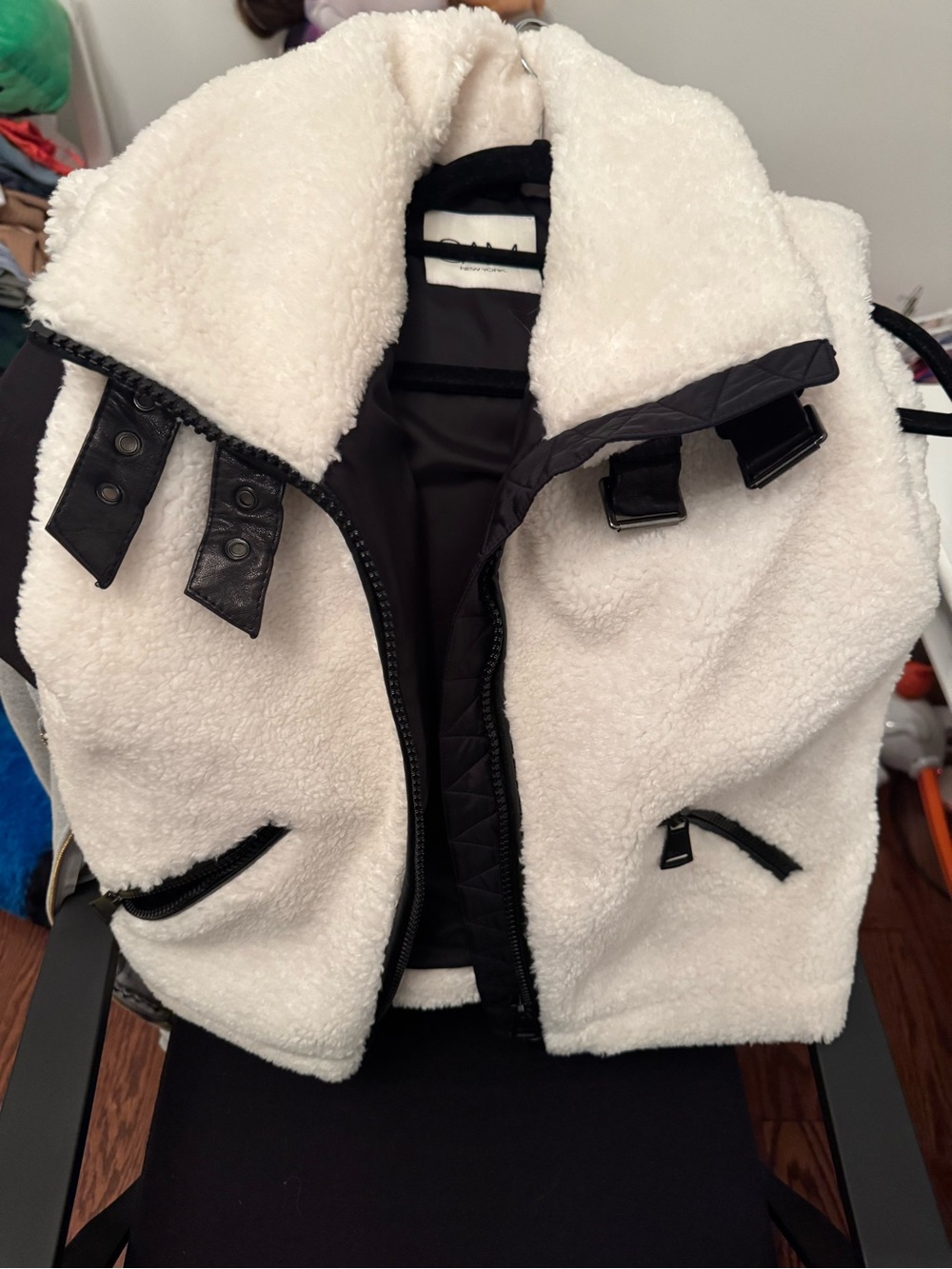 SAM. Cream Teddy Vest with Black Trim and Buckle Details